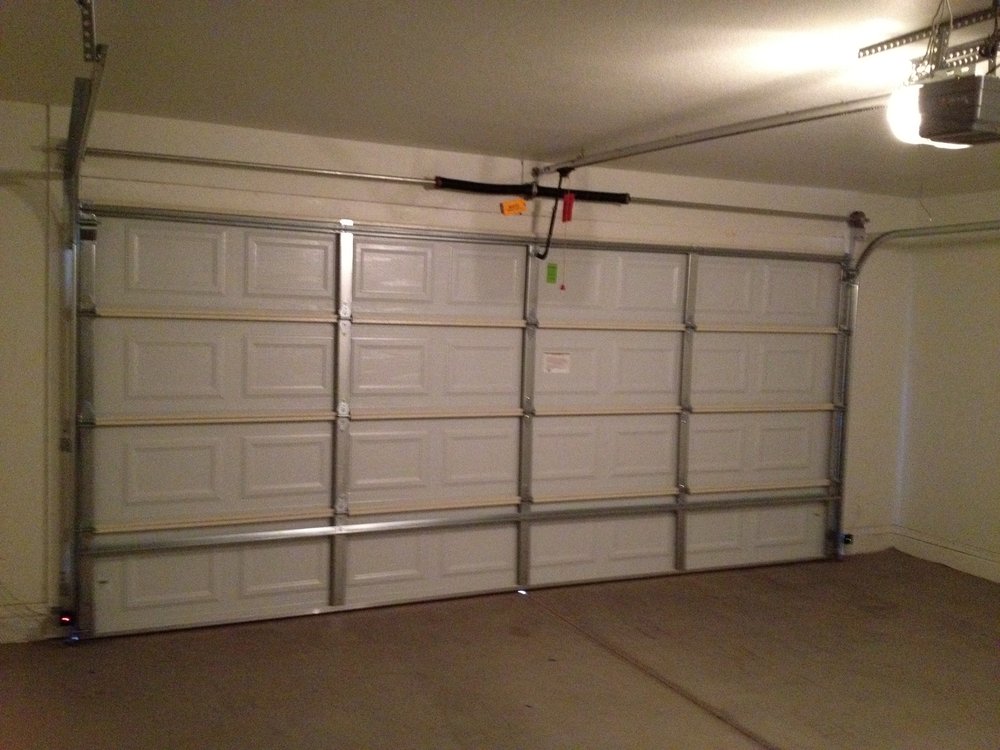 Why Is The Garage Door Opener Buzzing Garage Door Man Garage